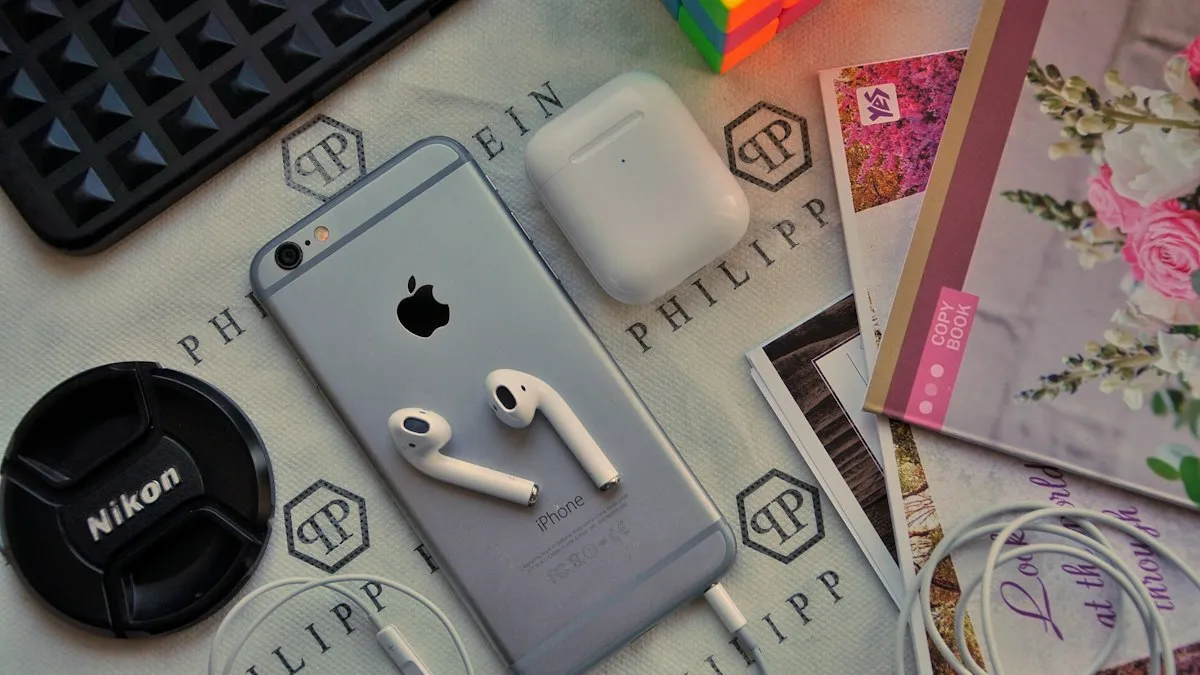 Apple AirPods on their white charging case