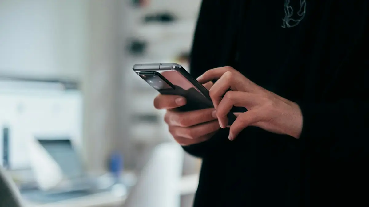 Person holding black android smartphone