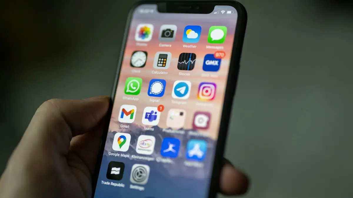 Person holding black iphone 4