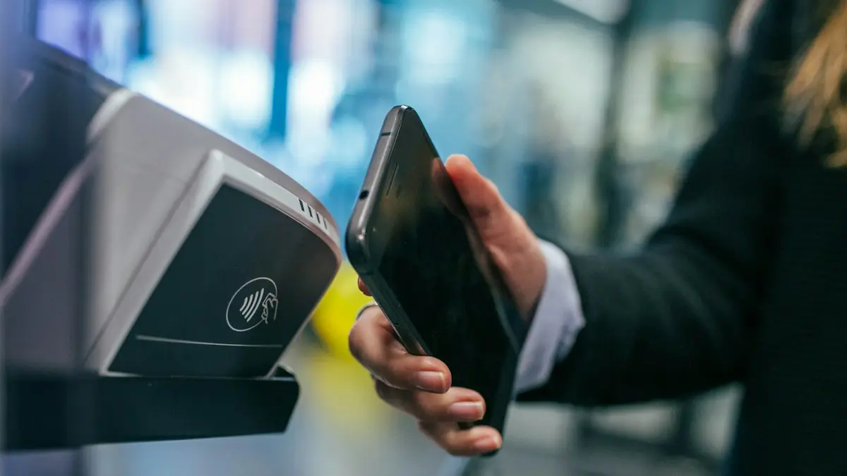 Paying with a smartphone at a contactless payment reader