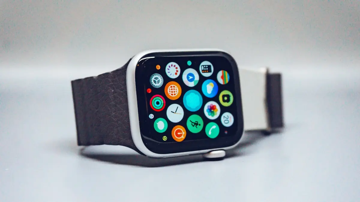 A smartwatch with a dark textured band and a colorful app icon display