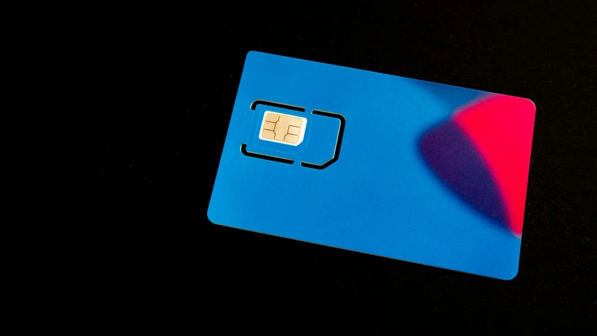 A blue SIM card on a dark surface