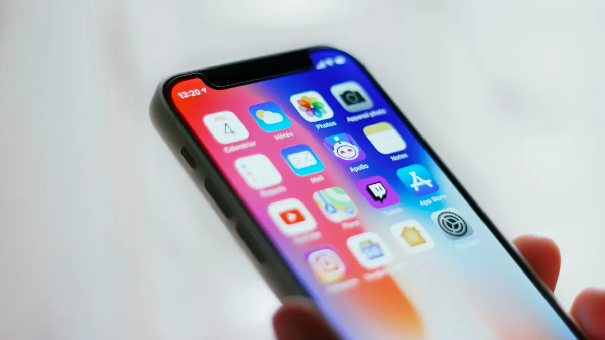 Person holding black iphone 4