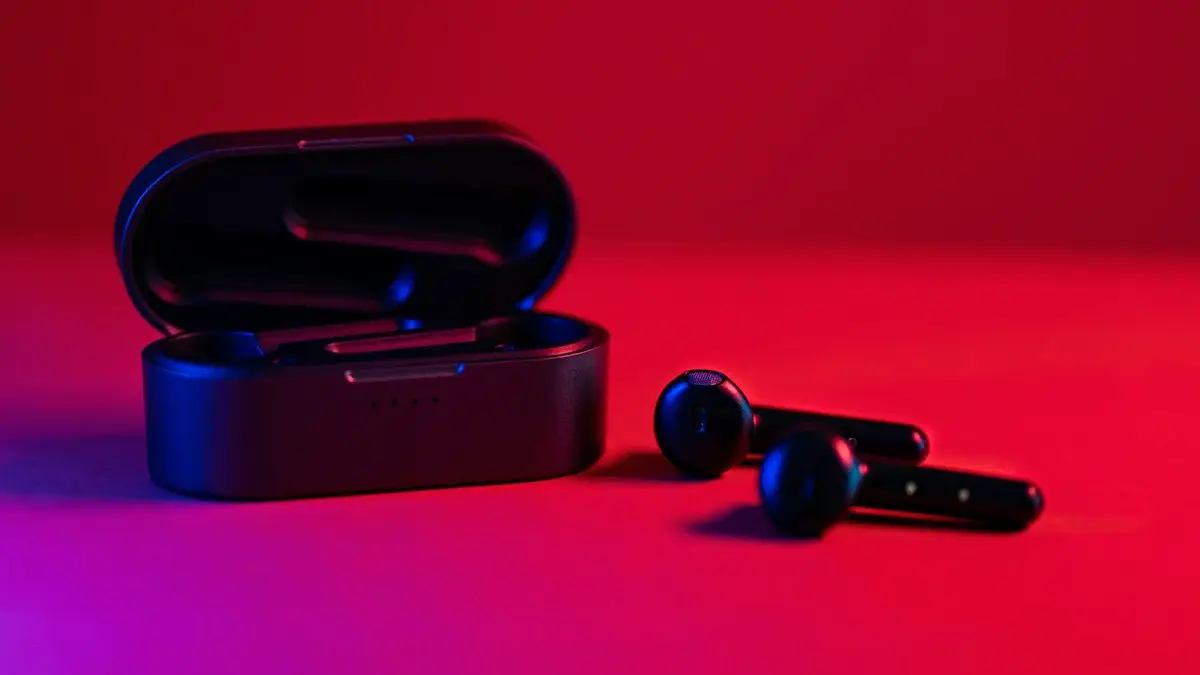 Black and blue bluetooth earbuds