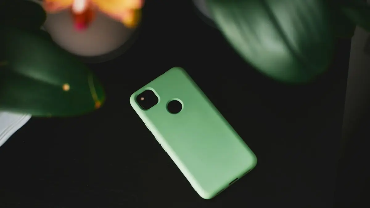 Green iphone case on black textile