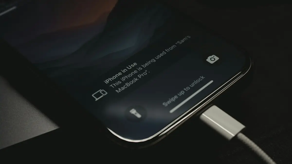 A close up of a cell phone charging