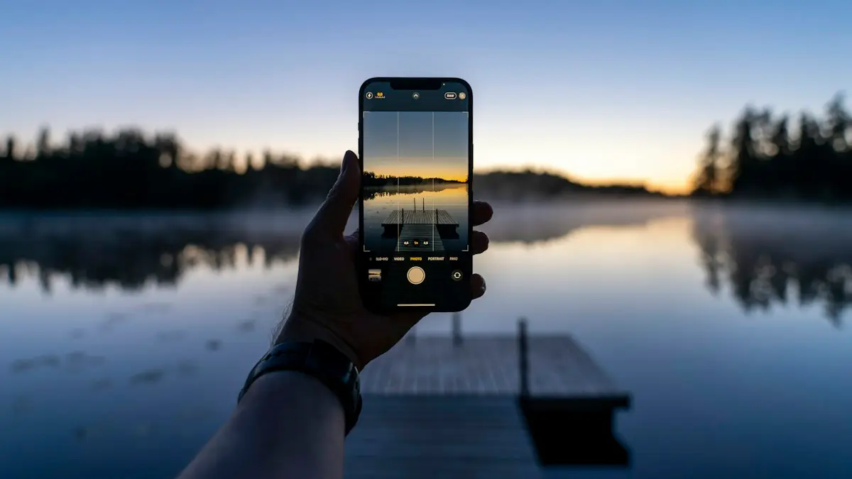 A hand holding a phone