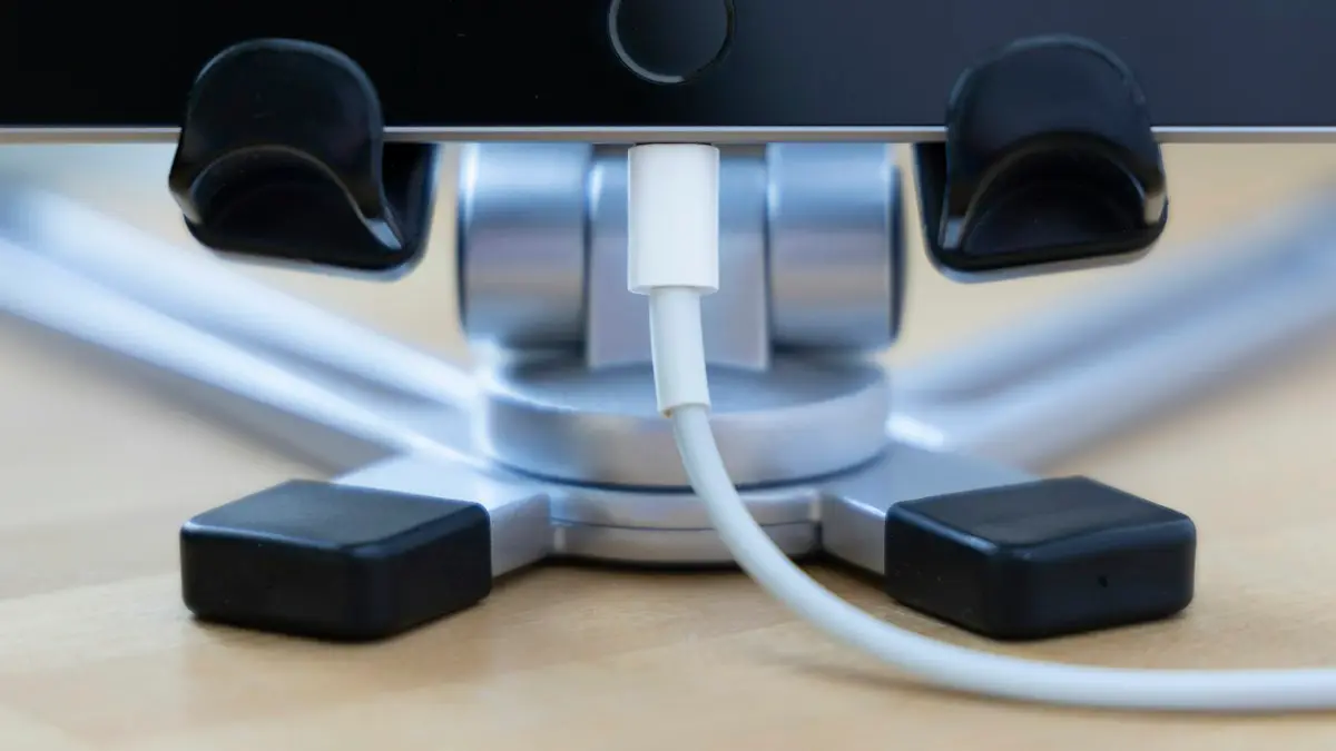 A close up of a device connected to a charger