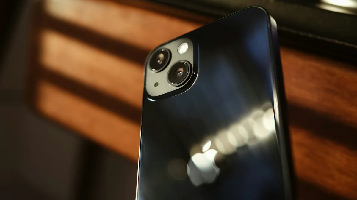 The back of a black iPhone showing its two camera lenses
