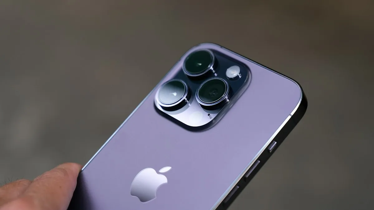 A close up of a person holding an iPhone