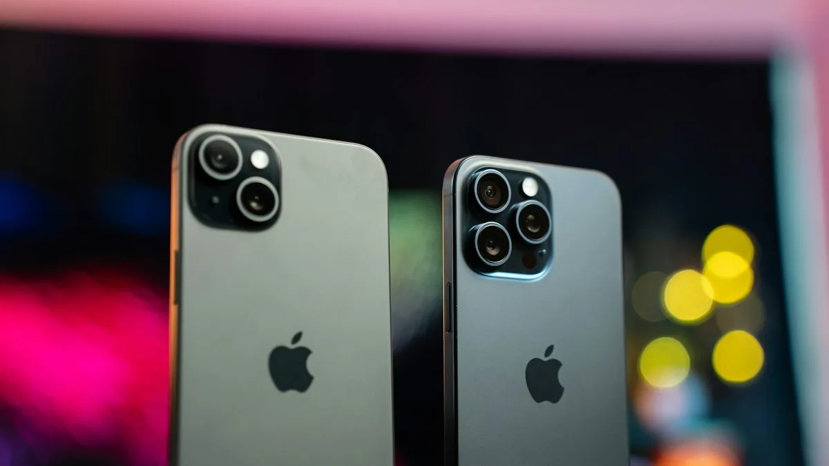 Two iPhones lying side by side on a table