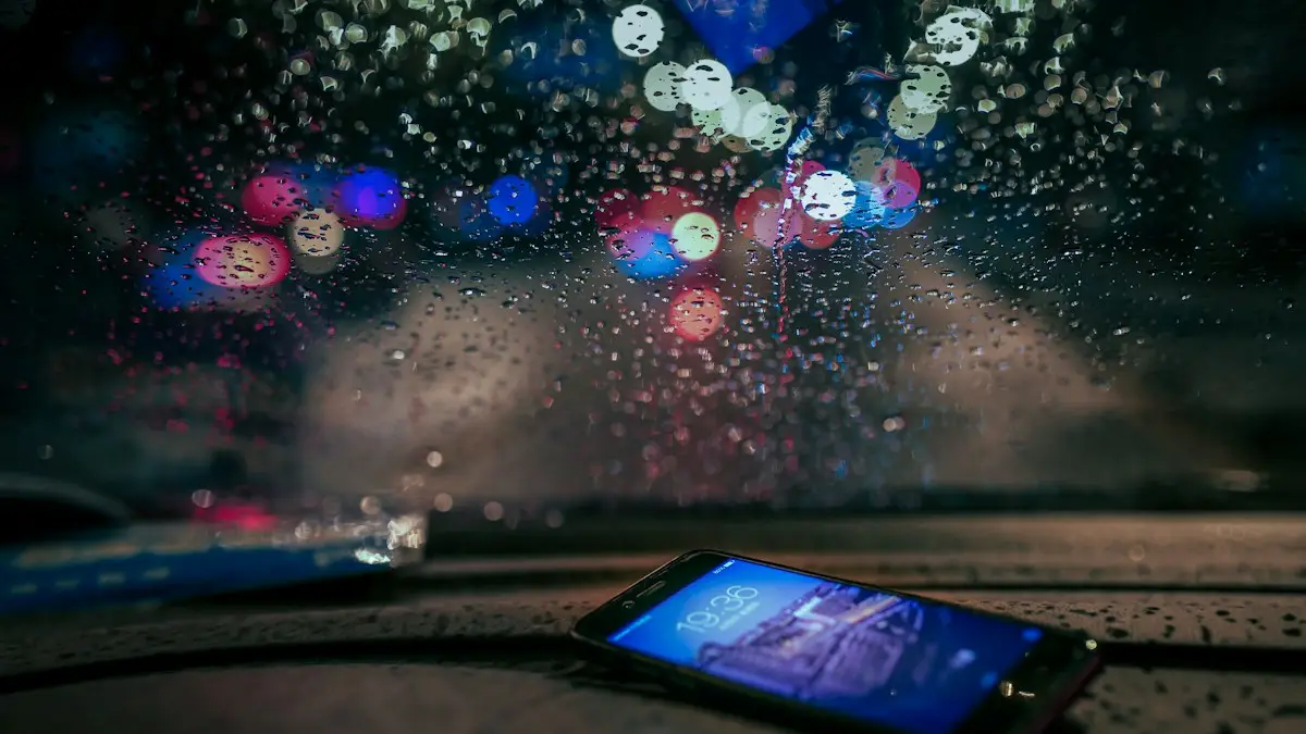 A cell phone on a car dashboard