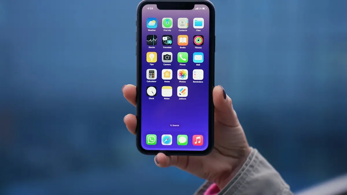 A person holding an iphone in their hand