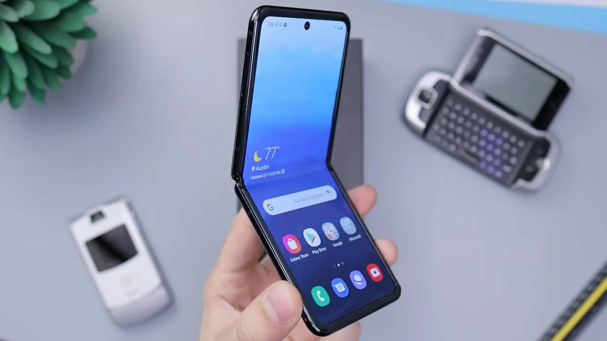 Person holding white android smartphone