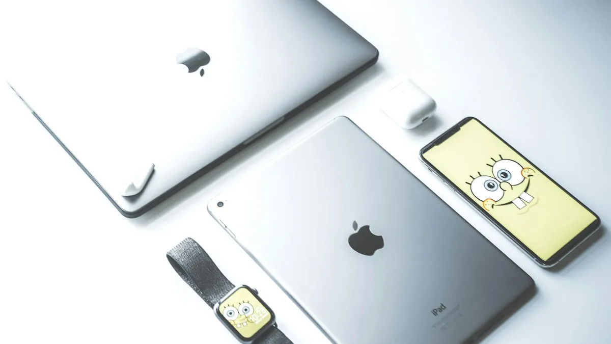 A MacBook Air, iPad and iPhone on a desk