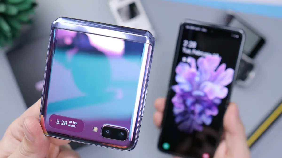 Black samsung android smartphone on white table