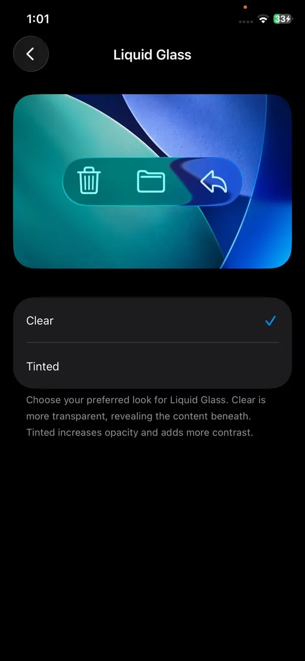 iOS 26 Liquid Glass setting with Clear and Tinted options