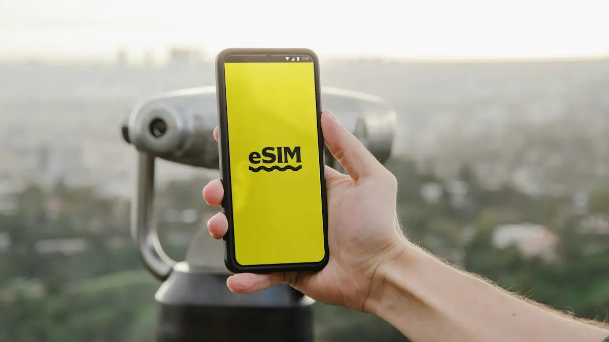 A person holding up a cell phone with a logo on it