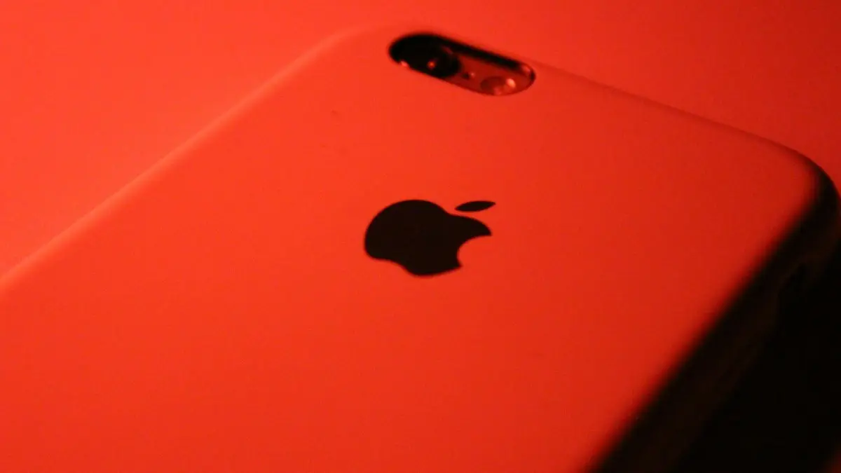 Silver iphone 6 on pink surface